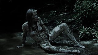 Brunette is having solo in the mud