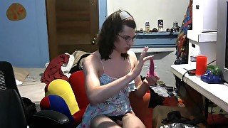 Femboy masturbating showing off in slutty dress butt plug