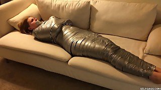 Duct Tape Wrapped Girl Gagged In Mummification Bondage