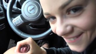 Beautiful blonde teen gives a wonderful handjob in the car