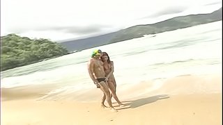 Redhead tranny in bikini gets rammed on a beach