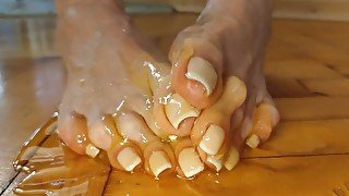 Wiggling long toes with French in Honey. Close up - Novem Olga