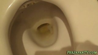 Asian babe filmed pissing