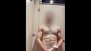 Horny daddy jerks off in the shower of public locker.