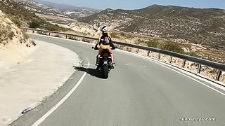 Sexyt bike chick masturbating on the bike