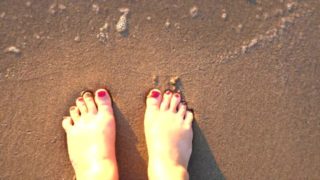 Walking Barefoot On The Beach