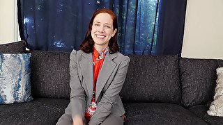 April sit in her suit jacket giving an interview - WeAreHairy