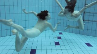 Two hot hairy beauties underwater