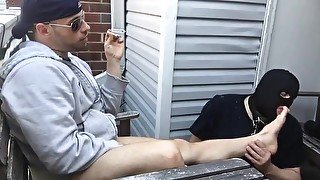 SLUT SERVING HIS OWNER WHILE HE IS SMOKING