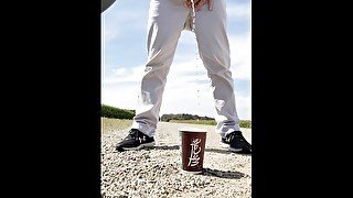 Windy Outdoor Stream Pissing in a McDonald's Cup