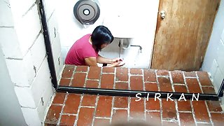 Black haired chubby girl taking a piss and blowing her nose