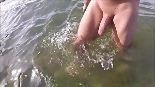 watch me with my big dick at the beach striping and in the water