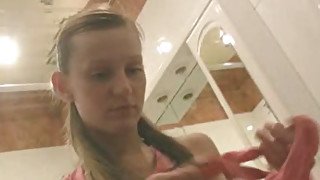 Girl pisses sitting in the toilet