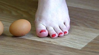 Fat legs bare feet mercilessly trampled banana and raw eggs. Crush Fetish.