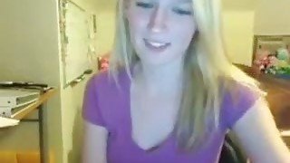 Webcam solo video with a charming blonde teen flashing her small tits