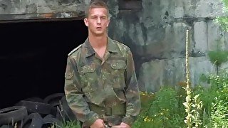 Young gays in uniform exchange blowjobs on the roadside