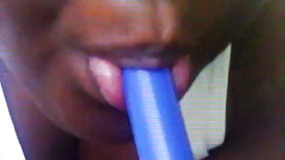 Ebony fattie masturbates poking her black poon with dildo