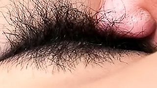 Hitomi Ikeno's hairy pussy gets licked and she moans loudly