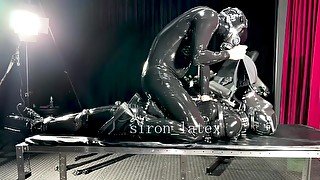 Rubber doll bondage