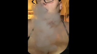 Fat babe listening to music, smoking vape, POV