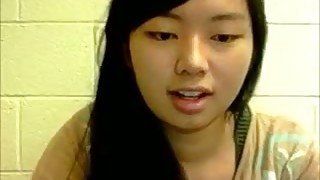 Asian young cutie rubs her pussy and nipples on webcam