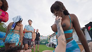 Spicy black chicks are having outdoor sex at the party