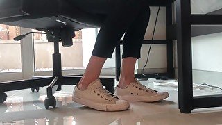 Girl With Itchy Fungus Feet In Converse Sneakers