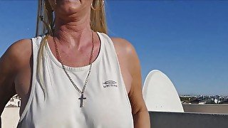 Exercising outdoors in a tiny vest top, flashing my tits