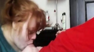 Redhead wife has oral sex