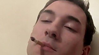 Twink Paradox strokes cock during smoking fetish solo