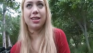 girl blows in a public park