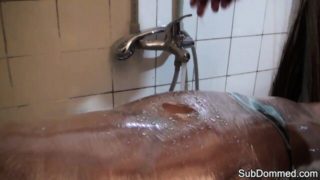 Submissive blonde gets dominated with water