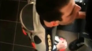 Biker gives blowjon to skin in toilets