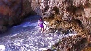 Nice beach sex with a French curly brunette taking things in her own hands jerking it and receiving a nice hot load on her face