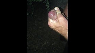 Out for a late night walk together and she helps me piss by pulling my foreskin back for me