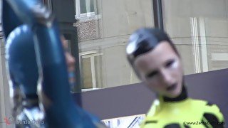 Through The City In A Tight Latex Costume - Watch4Fetish