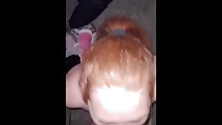 Pierced redhead sucks cock