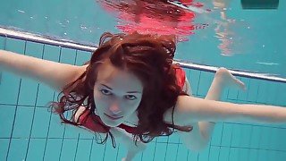 Red Dressed teen 18+ Swimming With Her Eyes Opened