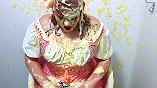 Chubby Little Miss Muffet gets covered in custard