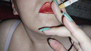 Smoking with red lipstick