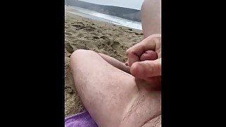 Stroking in the sand, Cumming at the beach