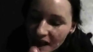 Horny brunette licks hard cock at home