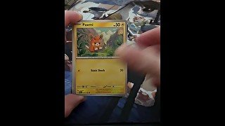 Nerd Opening a Pack of Trading Cards