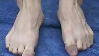 Blonde jock Jason sukcing his own hot feet outdoors