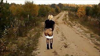 Girl piss in forest road