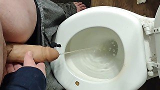 Transman pissing with STP prosthetics dick