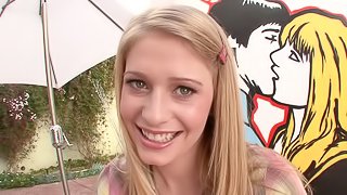 Young babe Allie James deepthroats a fat cock outdoors