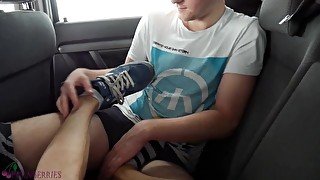 Colleague from highschool gave me footjob in a car