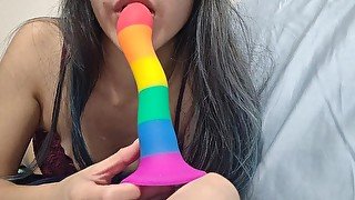 cute asian babe sucks her dildo wishing it was you