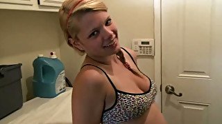 Blonde loving sweetheart in the laundry room showing goodies